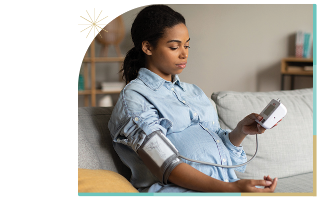 pregnant woman tracking her blood pressure