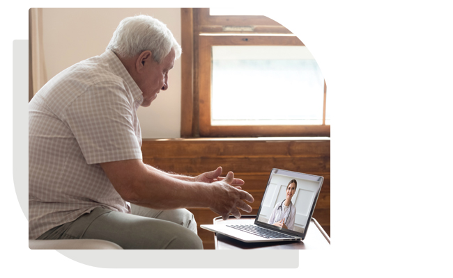 Man on computer meeting with a provider