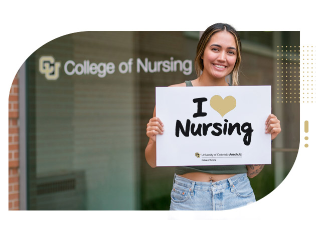 Student Nurse holding a 'I Am a CU Nurse