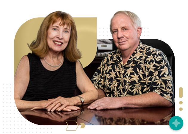 Senior older brother and sister sitting at a table