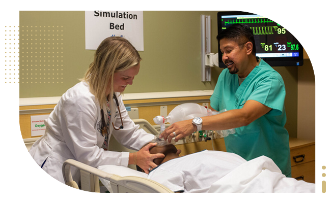 Female nurse and male tech in simulation room