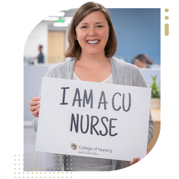 Student nurse holding 'I Am A CU Nurse' sign