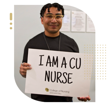 Student nurse holding 'I Am A CU Nurse' sign