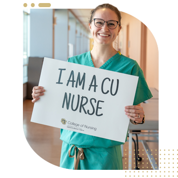 Student nurse holding 'I Am A CU Nurse' sign