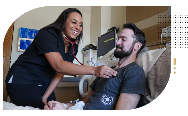 Female nurse listens to hearbeat of male patient in hospital Female nurse listens to hearbeat of male patient in hospital
